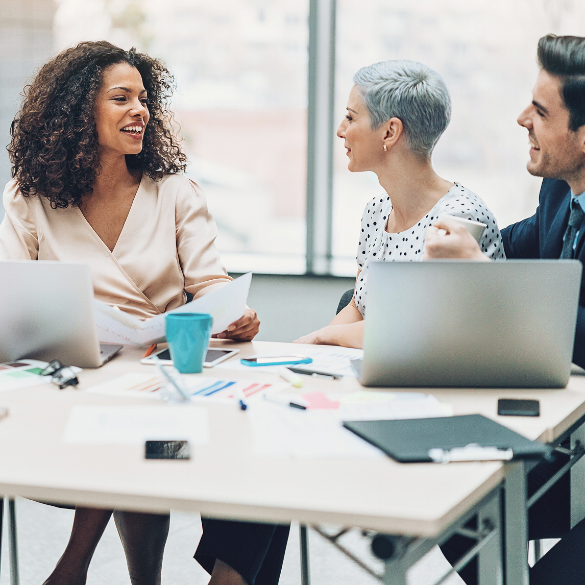women talking office