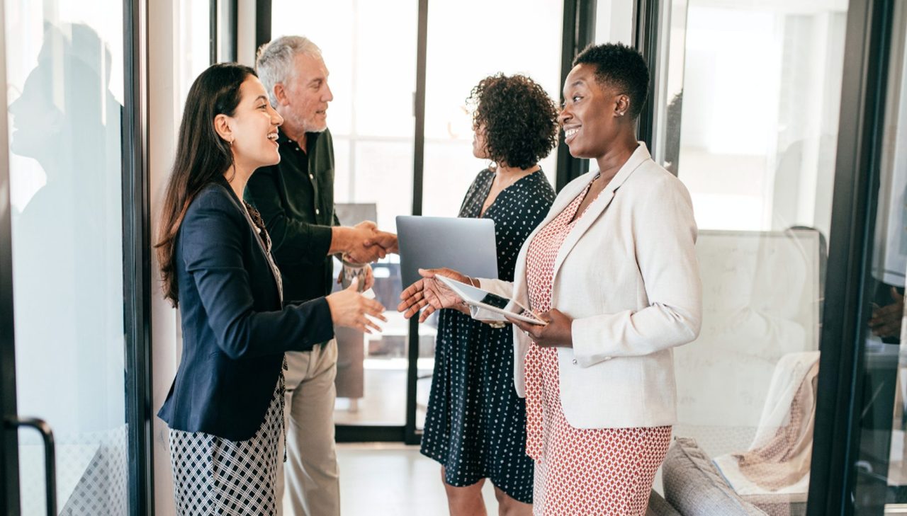 An image of experienced UX talent working with a client team, for a case study for staffing in healthcare technology.