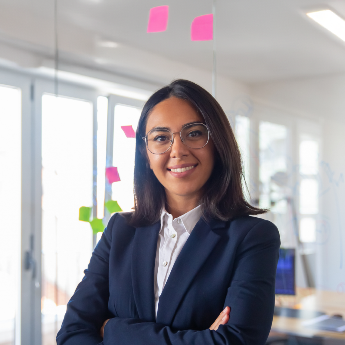 A UX writer who was hired through design talent staff augmentation, working as part of a US team.